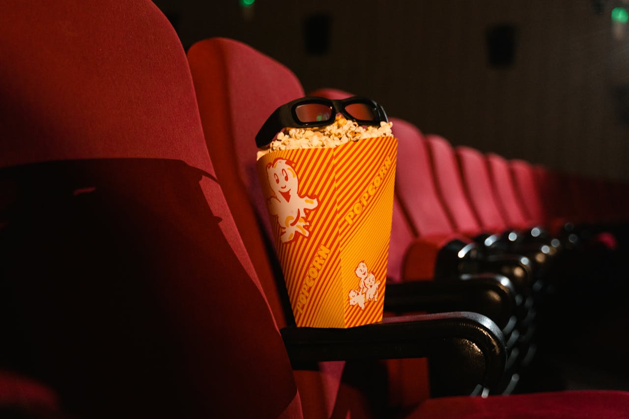 Mastering the First Impression: Your intriguing post title goes here Cinema seat with popcorn and 3D glasses perfectly capturing the movie theater experience.